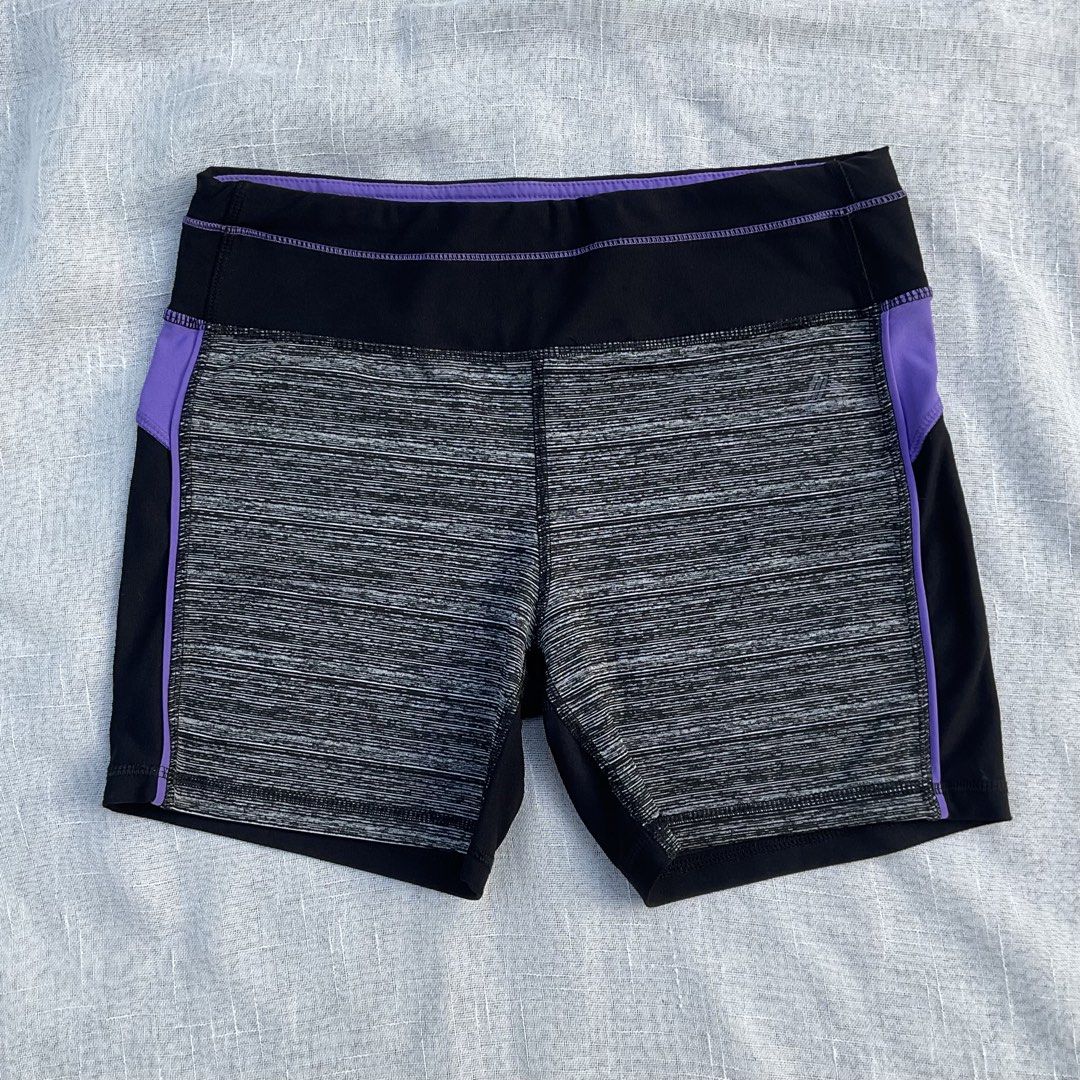 REEBOOK CYCLING SHORTS (Category: Activewear) located in Basista. Submitted by b.boutique (Listing ID 1467935819, Image 1). Description: REEBOOK CYCLING SHORTS Size: 27-33 Color: Black and Purple Like new condition! With pocket!.
