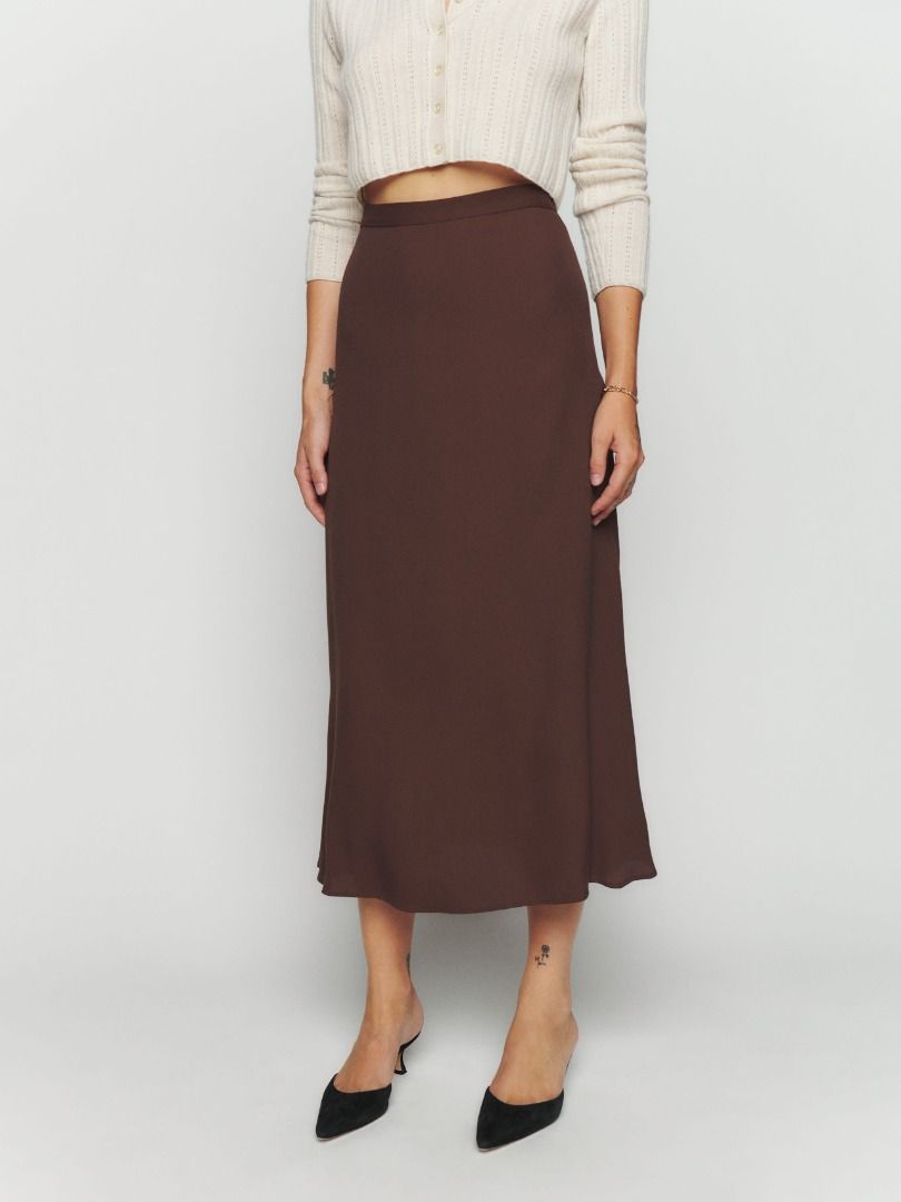 Reformation Bea A-line Skirt (Category: Skirts) located in Pasig City. Submitted by cp_sells (Listing ID 1467922750, Image 1). Description: Size: S Color: Brown Condition: Like new RFS: Decluttering.