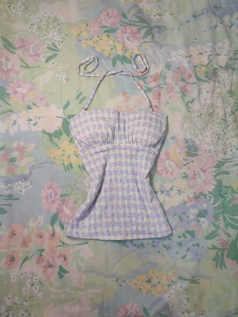 reworked Lilac Gingham Floral Halter Padded Top (Category: Sleeveless) located in Jaen. Submitted by roxantiago (Listing ID 1468037091, Image 1). Description: - Style: Cottagecore halter top - Pattern: Lilac and pale yellow gingham with all-over tiny floral prints - Details: Adjustable neck ties, cute back ribbon, and ruched bust with soft shaping - Fit: Fitted waist, hits right at the hips - Condition: Worn once, still in great shape S to M.