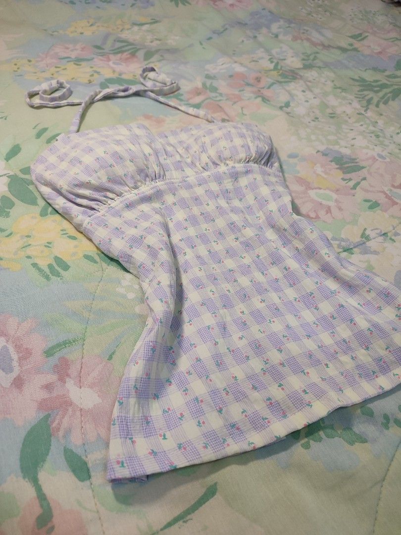 reworked Lilac Gingham Floral Halter Padded Top (Category: Sleeveless) located in Jaen. Submitted by roxantiago (Listing ID 1468037091, Image 2). Description: - Style: Cottagecore halter top - Pattern: Lilac and pale yellow gingham with all-over tiny floral prints - Details: Adjustable neck ties, cute back ribbon, and ruched bust with soft shaping - Fit: Fitted waist, hits right at the hips - Condition: Worn once, still in great shape S to M.