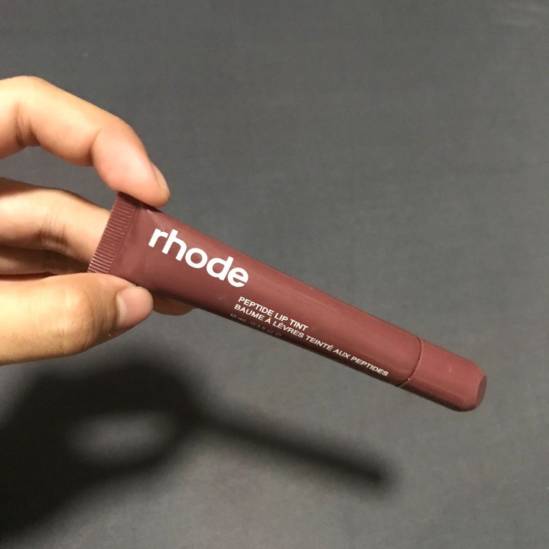 Rhode Lip Peptide in PBJ (Category: Makeup) located in Pasuquin. Submitted by xixiaaa_cc (Listing ID 1467962424, Image 3). Description: ୨ৎ RHODE LIP PEPTIDE — PBJ 🍇🎀 ♡ Shade: PBJ ♡ Condition: Used, approximately 70% product remaining ♡ RFS: Decluttering (not my shade) ୨ৎ PAYMENT METHODS 💸 ♡ GCash ♡ Bank Transfer 📌 Pay as you order! Actual photos posted. DM for inquiries and orders. 💌.