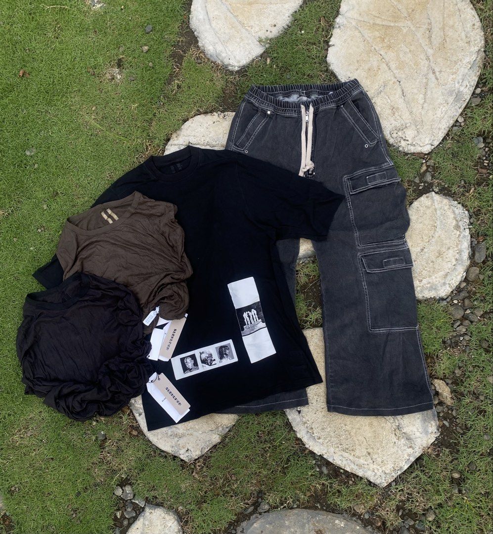 Rick Owens Bundle/ Subhuman Inhuman (Category: Luxury Apparel) located in Roxas City. Submitted by dua-garments23 (Listing ID 1467963052, Image 1). Description: - Rick Owens Streetwear bundle: Dark grey cargo pants + 1 graphic tee + 2 short-sleeve shirt - Cargo pants: Thick drawstrings and deep pockets - Graphic tee: Includes black photo-print shirt with original paper tags attached - Layered tops: Solid black and dark brown - Perfect matched set