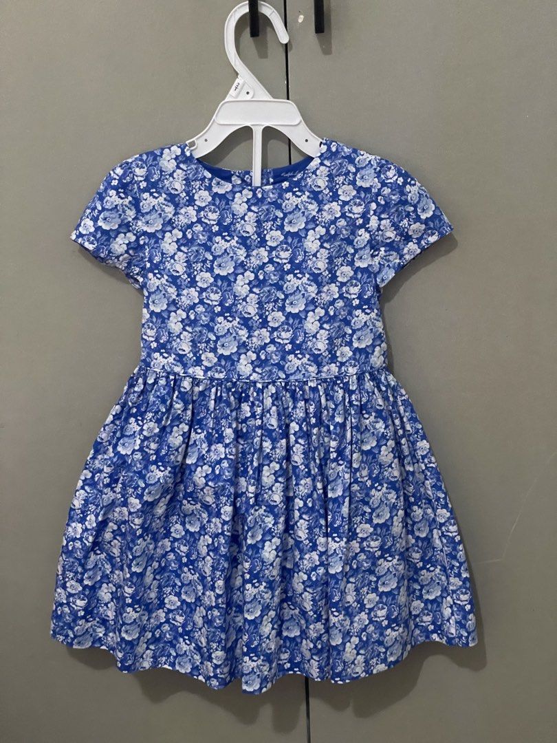 RL Floral Dress with bloomer (Category: Babies & Kids Fashion) located in Angono. Submitted by luxebynica (Listing ID 1467851685, Image 1). Description: Ralph Lauren Size: 24M (24 months), with “90” also printed on the tag, can fit up to 36 months, super nice in actual, used 2x Made in: Cambodia Style: Royal blue and white floral dress with short sleeves and a gathered skirt.