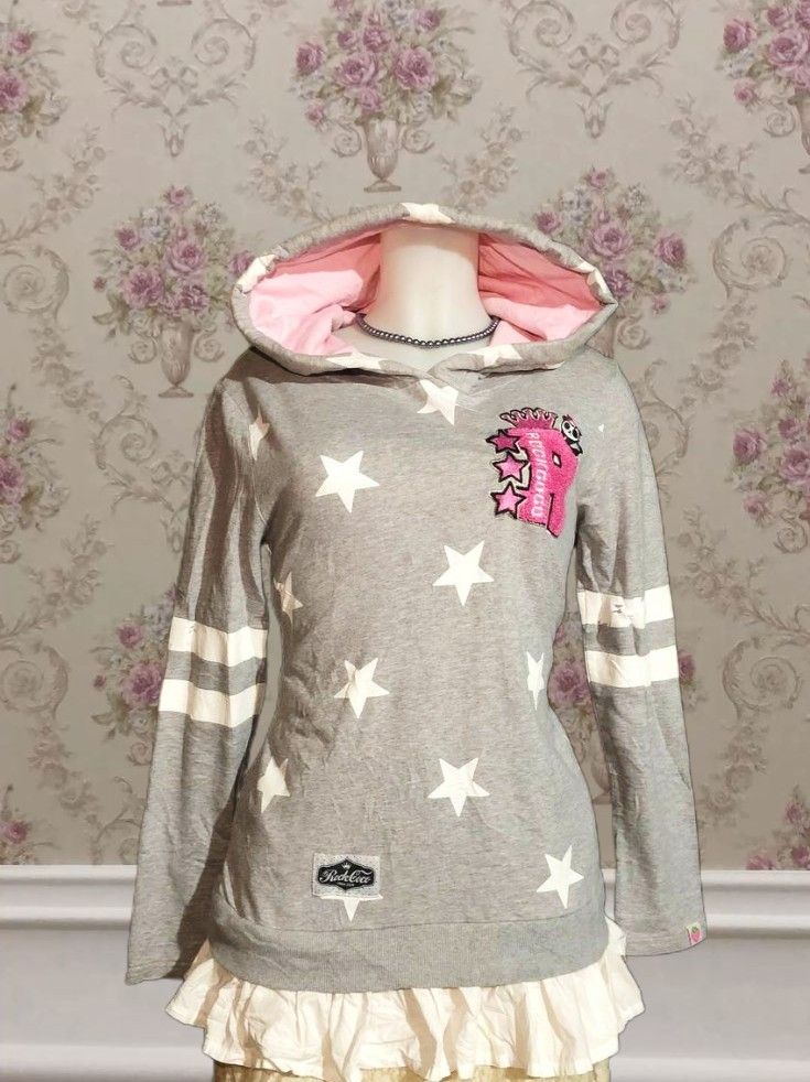 ROCK COCO hoodie (Category: Coats, Jackets and Outerwear) located in Victorias. Submitted by nichepicks (Listing ID 1467858907, Image 1). Description: ROCKCOCO hoodie with ruffled bottom – size s to m – have minor crack prints on sleeves 📍. negros occ.