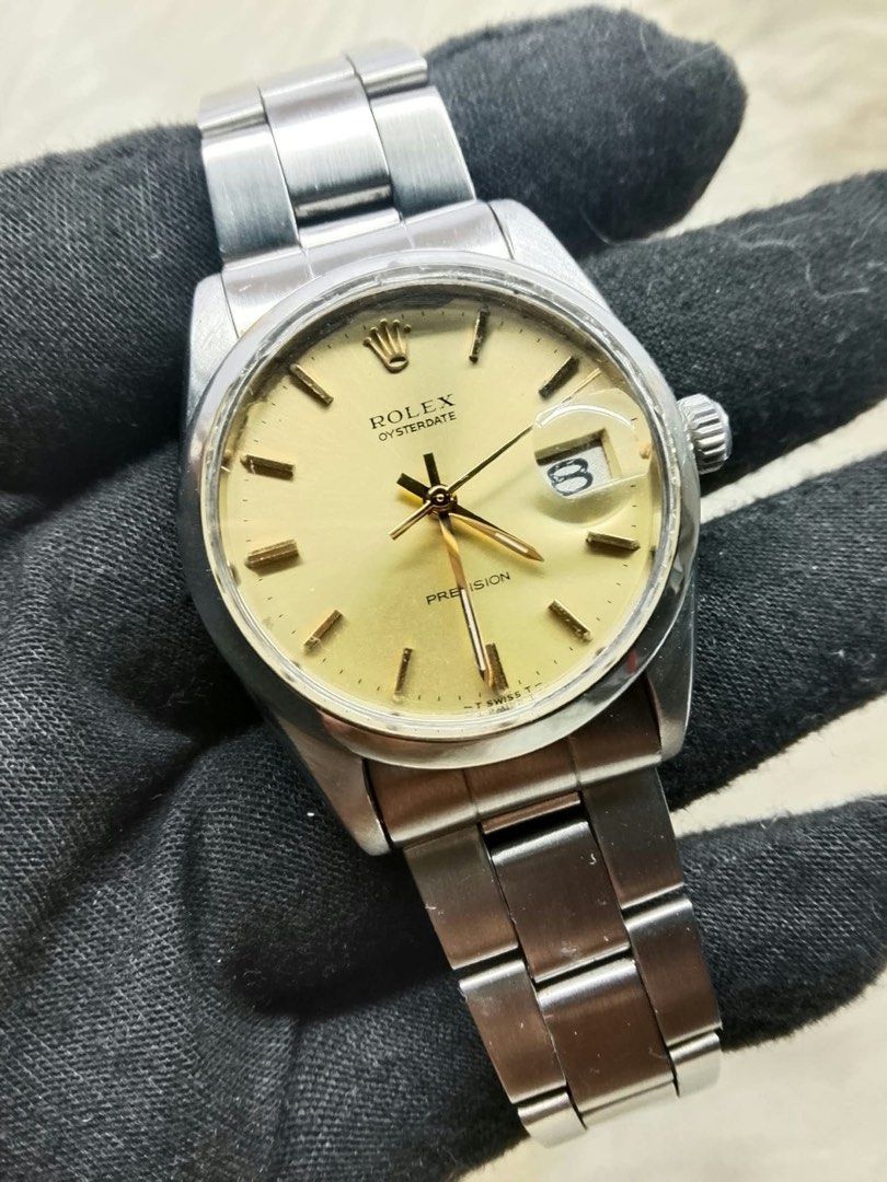 Rolex Oysterdate Precision 6694 (Serviced) (Category: Luxury Watches) located in Pasig City. Submitted by tommychonk (Listing ID 1467594234, Image 1). Description: - Newly serviced -Oct 14, 2026 - Brand/Model: Rolex Oysterdate Precision -Ref 6694; 34mm - Movement: Manual wind - Dial: Champagne sunburst with gold markers and hands - Bracelet: All original - Features: Date window with cyclops lens, signed crown, signed deployment clasp with coronet