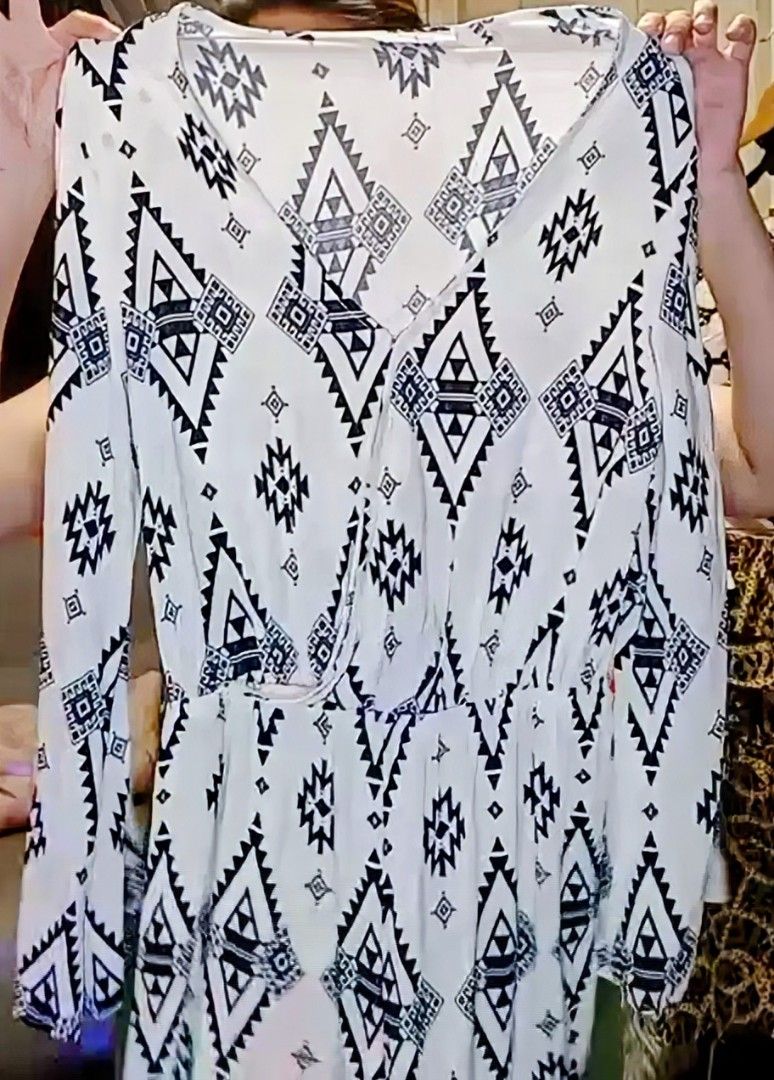 Romper Shorts - Aztec/Tribal print (Category: Activewear) located in Quezon City. Submitted by drkco (Listing ID 1467946758, Image 1). Description: Fits a size small to medium gal. This is very nice, cool and comfy! - black and white tribal geometric print - flattering V-neckline with long sleeves - comfortable elastic waist for a great fit - flowy material - perfect for casual days and weekend outings.