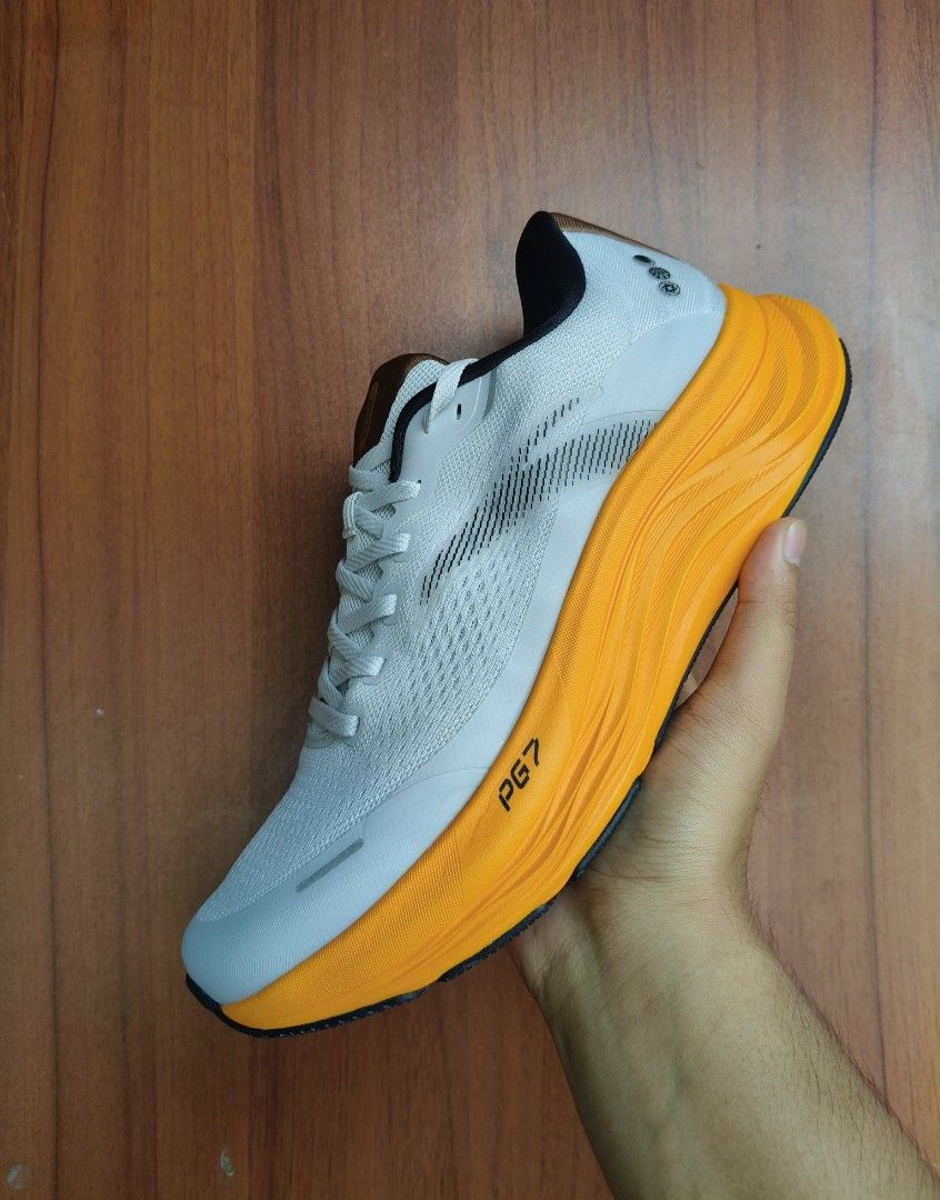 Running Shoes White Orange PG7 (Category: Sneakers) located in Taguig. Submitted by ogeeel (Listing ID 1467943495, Image 1). Description: For sale or Trade ANTA PG7 travel 2 Size 9/9.5/11 2250 orange 2499 blue Taguig location Meet up pick up lalamove J&T.