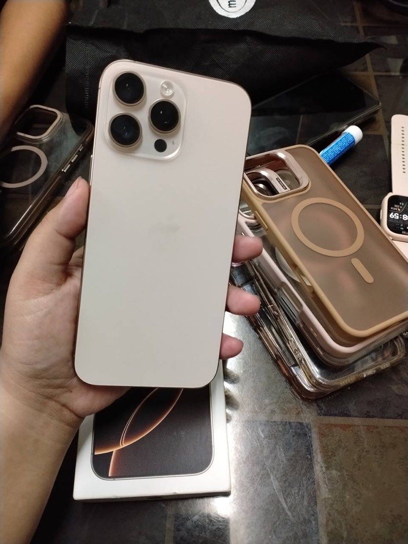 RUSH Iphone 16 pro max 256GB‼️ (Category: iPhone 16 Series) located in Manila. Submitted by angelo_deer (Listing ID 1467950765, Image 2). Description: iPhone 16 Pro Max – 256GB Dessert Titanium - with box (Same IMEI) & Original Cord - Underwarranty (Expired 12/04/26) - Battery health: 98% - iOS 27.0.1 last updated - ZP/A & NTC approved (Local Variant) - Openline and No History of Repair - No Issue and no dents - Free case - Nego pa if kukunin aga