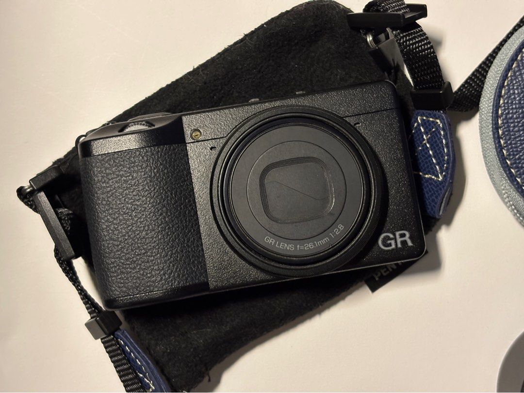 [RUSH] Ricoh GR IIIx + lens bundle (Category: Cameras) located in Manila. Submitted by yearielle19700 (Listing ID 1467969610, Image 1). Description: - Camera Model: Ricoh GR IIIx digital camera (fully working) - Condition: no issues no dents all buttons are working its good as new!! - battery, sd card, lens, strap included! - Storage: SanDisk microSD card with adapter included - battery, sd card, lens, strap are included Rfs: SELLING FOR RUSH i n