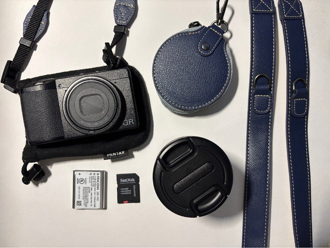 [RUSH] Ricoh GR IIIx + lens bundle (Category: Cameras) located in Manila. Submitted by yearielle19700 (Listing ID 1467969610, Image 3). Description: - Camera Model: Ricoh GR IIIx digital camera (fully working) - Condition: no issues no dents all buttons are working its good as new!! - battery, sd card, lens, strap included! - Storage: SanDisk microSD card with adapter included - battery, sd card, lens, strap are included Rfs: SELLING FOR RUSH i n