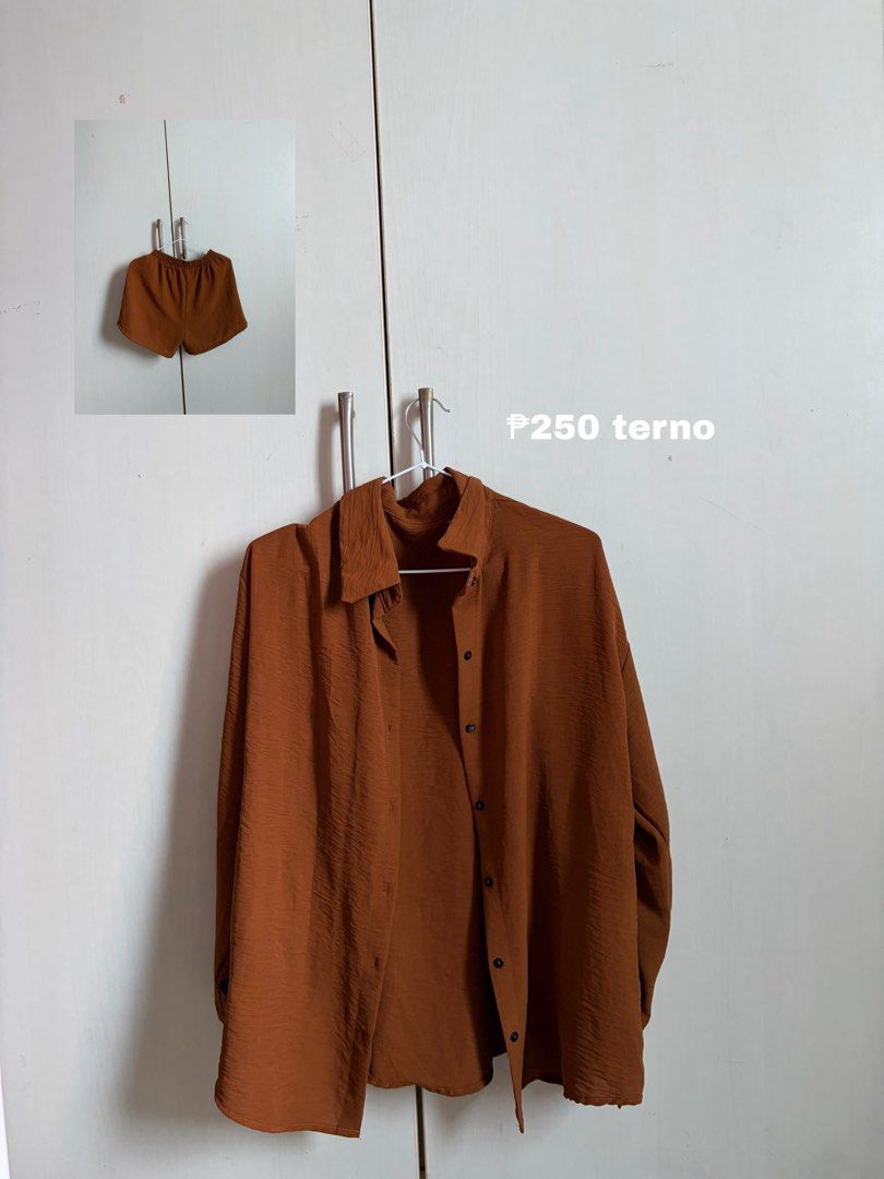 Rust Brown Long Sleeve Button Down Shirt and Shorts Terno (Category: Sets or Coordinates) located in Sariaya. Submitted by starstore.ph (Listing ID 1467888221, Image 1). Description: TERNO mop: gcash/maribank mod: jnt/lalamove/grab/meetup (mandaluyong or makati only) - Color: Rust brown - Set includes: Long sleeve button-down shirt and matching elastic waist shorts - Fabric: Lightweight with a crinkled texture - Fit: Easy and casual for everyday 