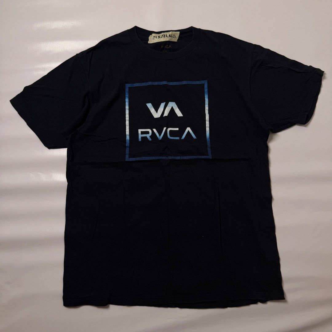 RVCA Box Logo Graphic T-Shirt Black (Category: Tshirts & Polo Shirts ) located in Gapan. Submitted by rasthriftshop17 (Listing ID 1467993281, Image 1). Description: Size on tag: L Dimes: 21 x 27 Condition: Excellent Color rate: 9/10 Issue: None.