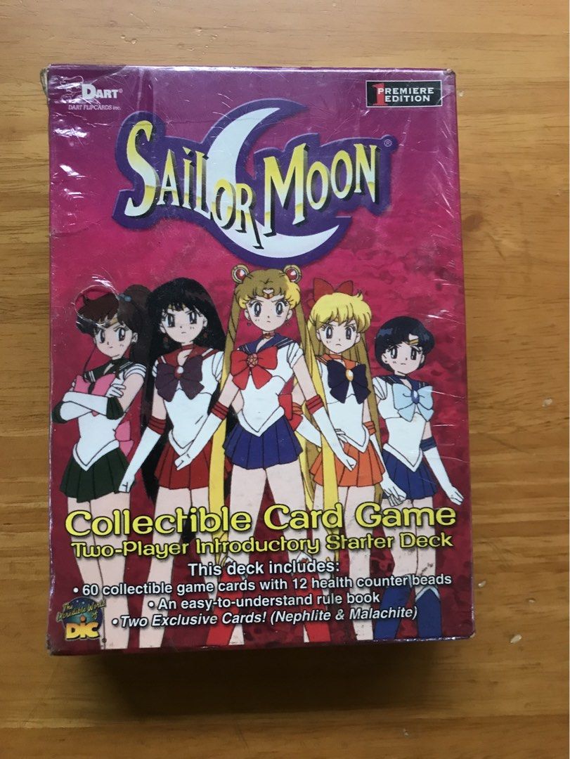 Sailor Moon Premiere Edition Booster Pack English (Category: Card Packs) located in Imus. Submitted by mrsz3r0 (Listing ID 1467909809, Image 1). Description: Sealed two-player introductory starter deck for the Sailor Moon Collectible Card Game. This Premiere Edition box includes 60 game cards, 12 health counter beads, and an easy-to-understand rule book. It also features two exclusive cards of Nephlite and Malachite. Perfect for fans of the class
