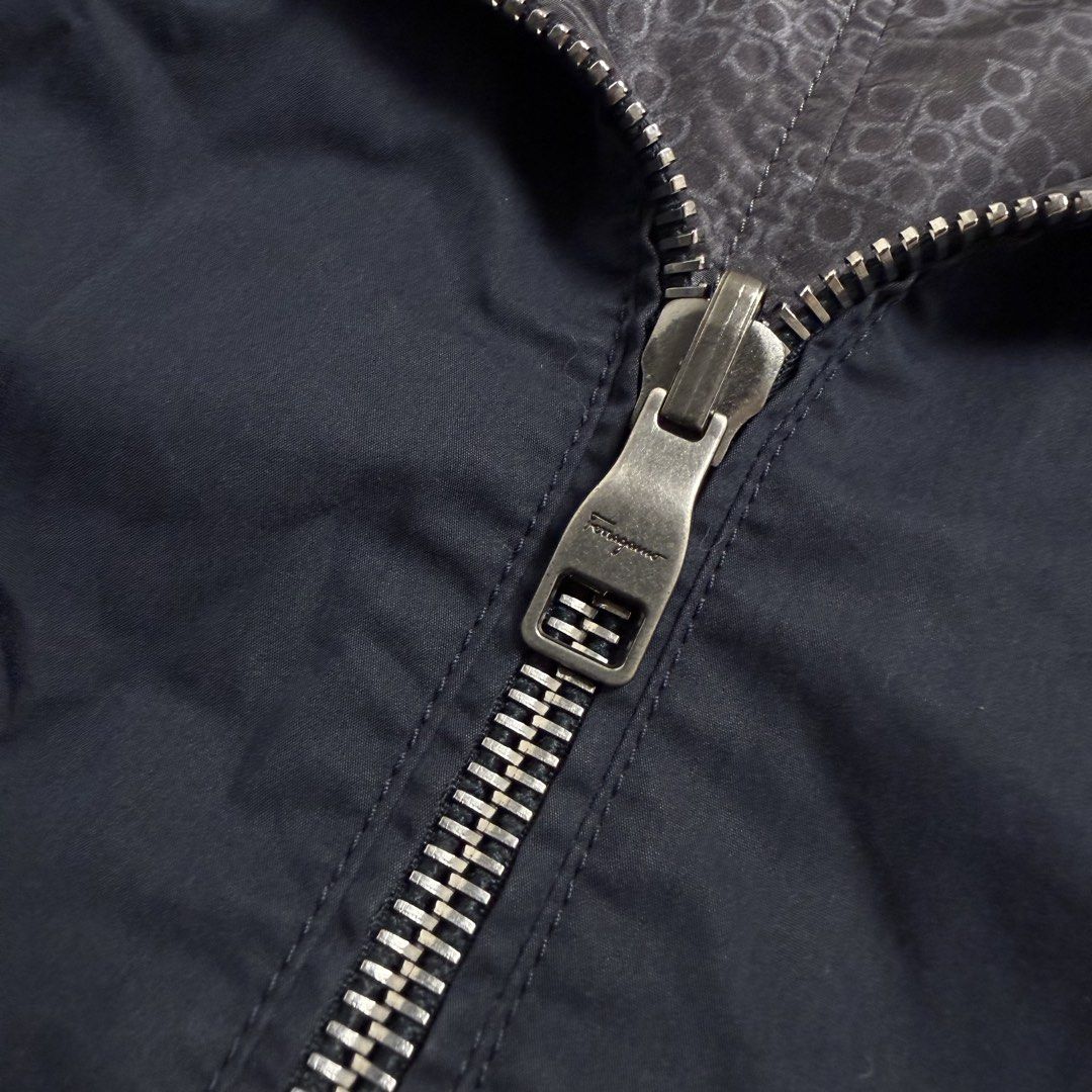 Salvatore Ferragamo Reversible Bomber Jacket Monogram Pattern Made in Italy (Category: Coats, Jackets and Outerwear) located in Cebu City. Submitted by inukaybyjlf (Listing ID 1468058422, Image 3). Description: Condition: Excellent Issue: Minimal slit check photo inner side Dimensions: 22x25.5 Best fit: S-M Please refer to photos for actual condition.