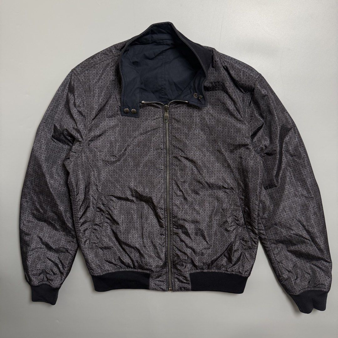 Salvatore Ferragamo Reversible Bomber Jacket Monogram Pattern Made in Italy (Category: Coats, Jackets and Outerwear) located in Cebu City. Submitted by inukaybyjlf (Listing ID 1468058422, Image 2). Description: Condition: Excellent Issue: Minimal slit check photo inner side Dimensions: 22x25.5 Best fit: S-M Please refer to photos for actual condition.