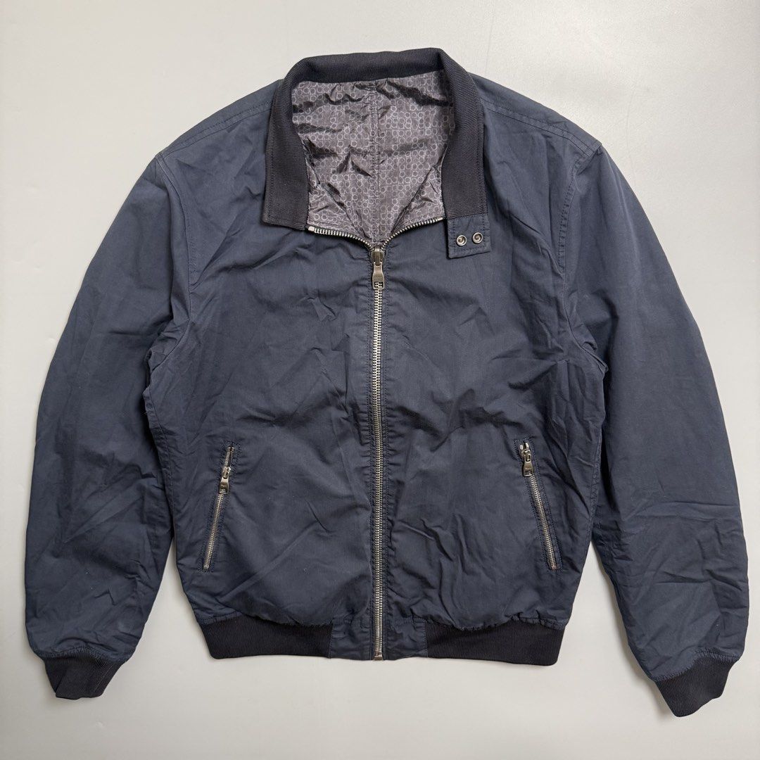 Salvatore Ferragamo Reversible Bomber Jacket Monogram Pattern Made in Italy (Category: Coats, Jackets and Outerwear) located in Cebu City. Submitted by inukaybyjlf (Listing ID 1468058422, Image 1). Description: Condition: Excellent Issue: Minimal slit check photo inner side Dimensions: 22x25.5 Best fit: S-M Please refer to photos for actual condition.