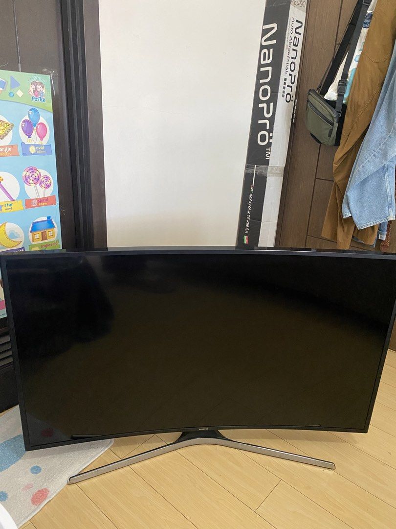 Samsung Smart LED tv 49” (Category: TV) located in Manila. Submitted by olxph_808966171 (Listing ID 1467901108, Image 1). Description: - Brand/Model: Samsung 49-inch Curved TV (UA49KU6300GXXP) - Color: Elegant black finish with silver stand legs - Connectivity: Multiple HDMI and USB ports on the back panel - Specs: Made in Vietnam, AC 100-240V power supply - Ideal Use: Great immersive screen size for home entertainment, movies, and gaming - Condi