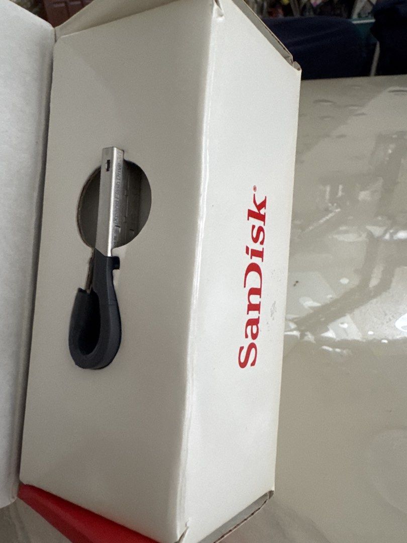SanDisk iXpand Flash Drive 32GB for iPhone iPad (Category: Hard Disks & Thumbdrives) located in Binan City. Submitted by mom-of-2 (Listing ID 1467863359, Image 2). Description: - Opened out of curiosity - Unused - Authentic SanDisk iXpand Flash Drive with 32GB capacity - Dual Lightning and USB 3.0 connectors for iPhone, iPad, and PC - Easily transfer photos, videos, and files on the go - Automatic camera roll backup feature - Flexible connector d