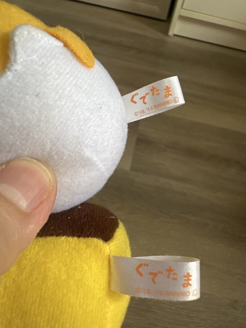 Sanrio Gudetama Plush Mascot Straps Set (Category: Plushies & Soft Toys) located in Cainta. Submitted by shopbyyna (Listing ID 1467892792, Image 2). Description: - Authentic Sanrio Gudetama plush mascots (Set of 2: Egg Shell & Toast) - Comes with original Sanrio fabric tags (Dated 2013 & 2015) - Equipped with orange hanging straps, perfect for bags, keys, or phones - Rare find for Gudetama collectors!.