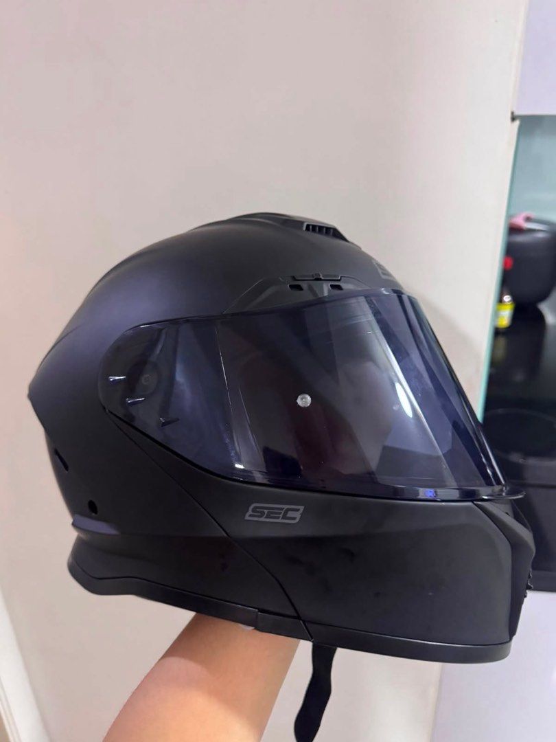 SEC X90 Focus Shell Matte Black Motorcycle Helmet Size L (Category: Bicycles) located in Manila. Submitted by luv_chesc4 (Listing ID 1468050326, Image 3). Description: - Color: Matte Black - Size: Large (fits 59-60cm head circumference) - Safety: DOT certified with original certification stickers intact - Visor: Tinted visor attached - Closure: Chin strap with quick-release buckle - Condition: Clean exterior finish - Complete inclusion may box pa