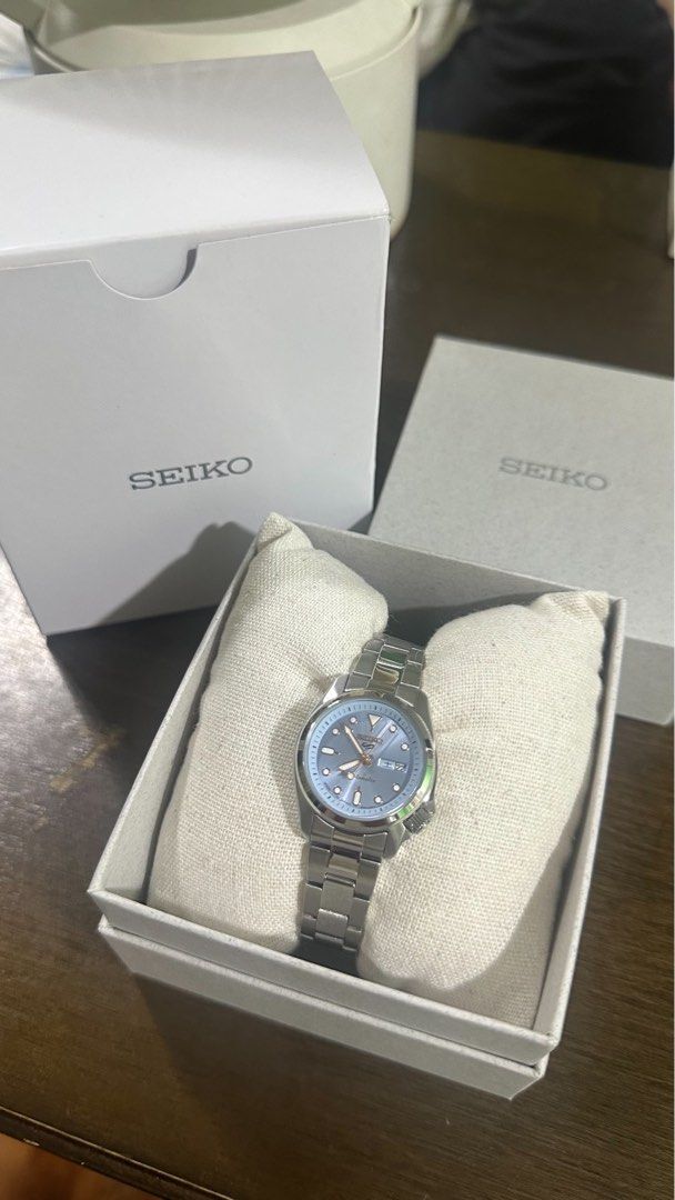 Seiko 5 SRRA001 Automatic Ice Blue Dial Watch (Category: Women's Watches) located in Quezon City. Submitted by gktan003602644 (Listing ID 1467875681, Image 1). Description: - Model: Seiko 5 Sports SRRA001 - Dial: Stunning ice blue with rose gold-tone hands and hour markers - Bracelet: Silver steel - Features: Date display at 3 o'clock, 21 jewels automatic movement - Condition: Brand new - Inclusions: Original white outer box and inner presentatio
