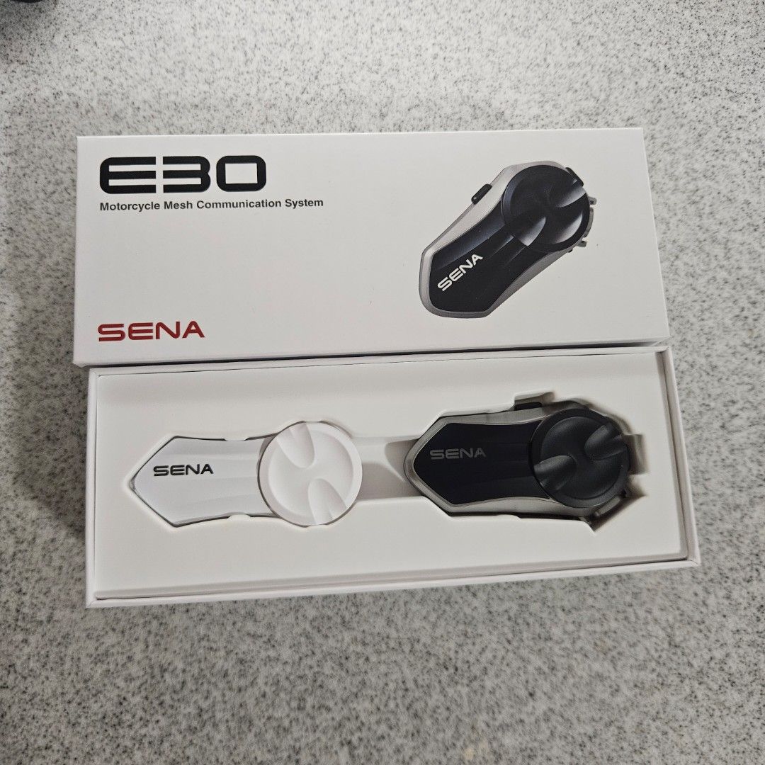 Sena E30 Intercom (Category: Motorcycle Accessories) located in Singapore. Submitted by koodoes4450 (Listing ID 1468028037, Image 3). Description: Sena E30 motorcycle mesh communication system. Box opened to check contents, never installed on any helmet. Complete unit inside original white packaging with extra white faceplate piece included. Bluetooth and mesh intercom capabilities for riders..