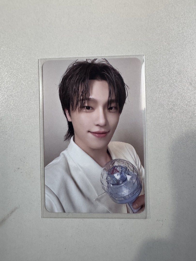 SEVENTEEN Dino New_ Caratzone Carzone pc (Category: K-Wave Merchandise) located in Antipolo. Submitted by cherrycheolcart (Listing ID 1467908754, Image 1). Description: - Official SEVENTEEN Dino photocard (white jacket, wet-look hair, holding Caratbong) - Condition: Mint, pulled straight from album into a protective sleeve - Stored safely in a smoke-free environment - Shipping: Packed securely with a top loader and cardboard backing.