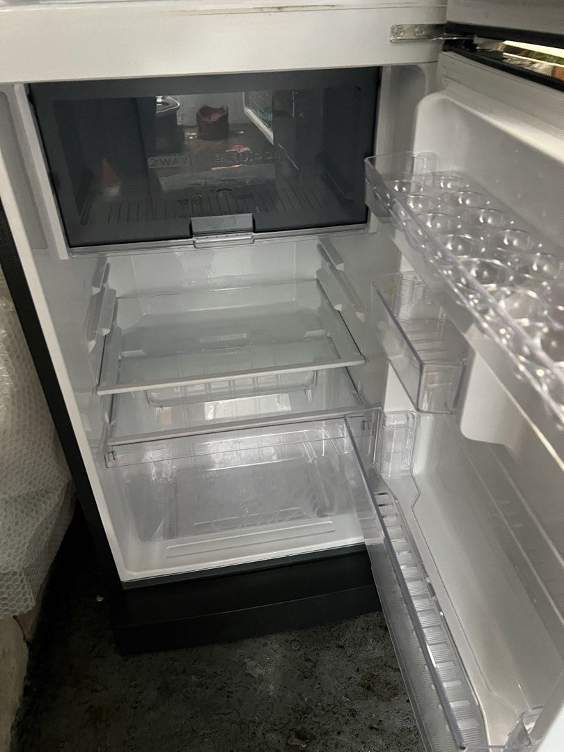Sharp J-Tech Inverter Double Door Refrigerator (Category: Refrigerators and Freezers) located in Rizal. Submitted by jirummm (Listing ID 1467894044, Image 3). Description: - Brand: Sharp J-Tech Inverter - Color: Sleek Black - Type: Two-door (Top freezer / Bottom fridge) - Features: Clear glass shelves and durable door bins -In very good condition -bought for 18k .