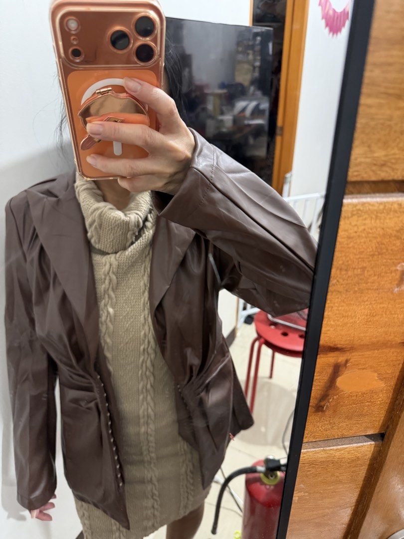 SHEIN Brown Faux Leather Blazer Jacket S (Category: Coats, Jackets and Outerwear) located in Makati City. Submitted by petite_preloved2 (Listing ID 1467841002, Image 1). Description: - Brand: SHEIN - Size: Small - Color: Neutral brown - Material: Faux leather - Design: Notched lapel, structured shoulders, tailored back panels, and gathered waist - Closure: Hook-and-eye front - Condition: Great layering piece for cooler weather.