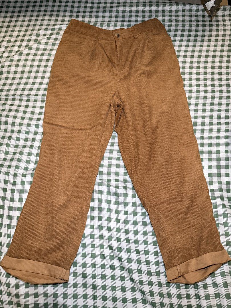 SHEIN Curve Corduroy Pants (Category: Jeans) located in San Miguel. Submitted by matchalatte23_ (Listing ID 1467990118, Image 2). Description: COLOR: Brown, White, Black 390 EACH - Brand: SHEIN Curve - Style: High waist corduroy pants with pleated front - Waist: Elastic back waistband for extra comfort - Details: Button closure and trendy roll-up cuffs - Fabric: Soft and cozy ribbed material - Condition: Brand new - Perfect for: Casual everyday o