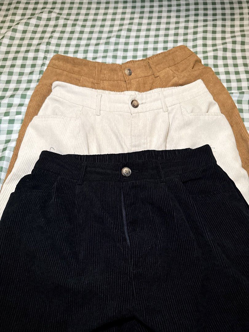 SHEIN Curve Corduroy Pants (Category: Jeans) located in San Miguel. Submitted by matchalatte23_ (Listing ID 1467990118, Image 1). Description: COLOR: Brown, White, Black 390 EACH - Brand: SHEIN Curve - Style: High waist corduroy pants with pleated front - Waist: Elastic back waistband for extra comfort - Details: Button closure and trendy roll-up cuffs - Fabric: Soft and cozy ribbed material - Condition: Brand new - Perfect for: Casual everyday o