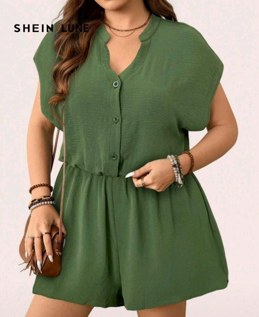 SHEIN LUNE Green Short Sleeve Button Front Romper Plus Size (Category: Rompers) located in Paranaque City. Submitted by zav_exlusive (Listing ID 1467851254, Image 2). Description: size: 1XL Shoulder 24.8" Bust 50.8" waist 34.6"-49.6" Length 36.6 condition: lightly used - Brand: SHEIN LUNE - Color: Solid olive green - Material: Lightweight textured fabric - Design: V-neckline with small collar, short cap sleeves, and partial button-down front - Fi