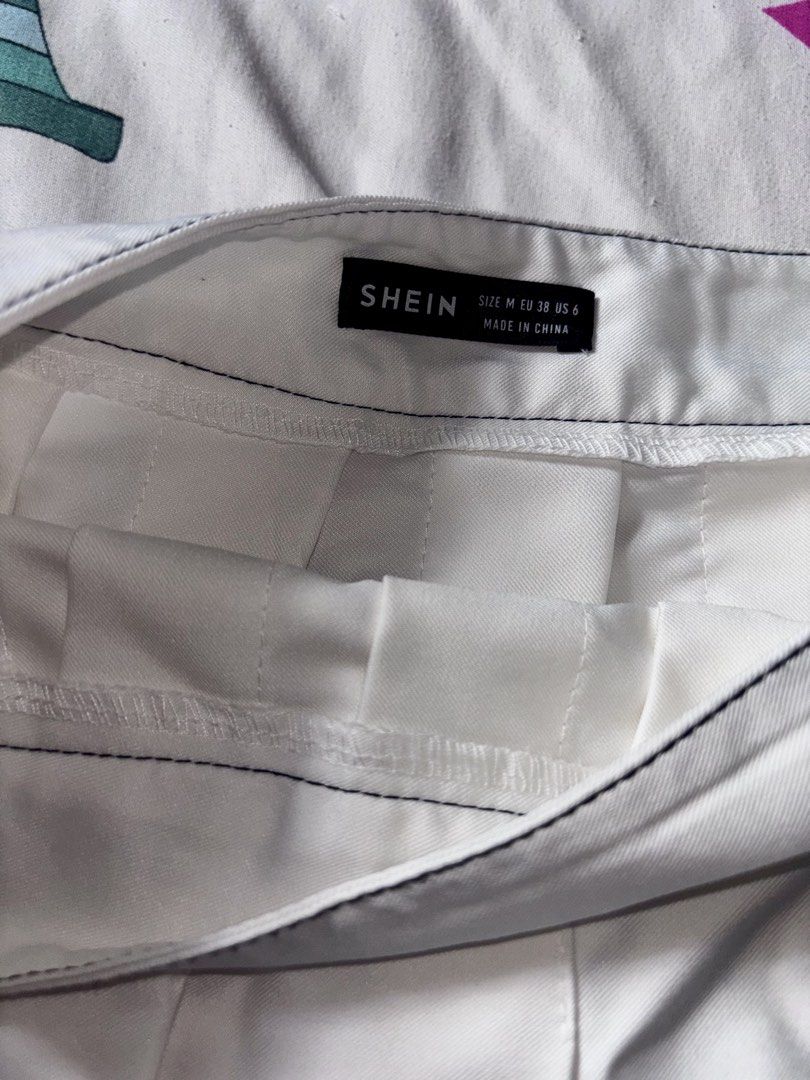 SHEIN White Pleated Skirt Size M (Category: Skirts) located in Bacoor. Submitted by fmax19 (Listing ID 1467899721, Image 3). Description: - Brand: SHEIN - Size: Medium (Fits EU 38 / US 6) - Color: White .