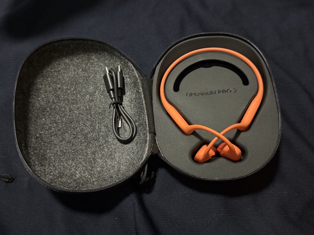 Shokz OpenRun Pro 2 Mini Orange (Category: Headphones & Headsets) located in Pasig City. Submitted by markentrep (Listing ID 1467985091, Image 3). Description: Condition: -Pre-loved / Good as new condition, fully functional -Seldom used, hindi na nagagamit kaya benta na lang sayang nakatambak -Bought directly from Digital Walker The Podium (July 2026) Inclusions: -Shokz OpenRun Pro 2 Mini Unit (Orange) -Original Hard Carrying Case -Original Charg