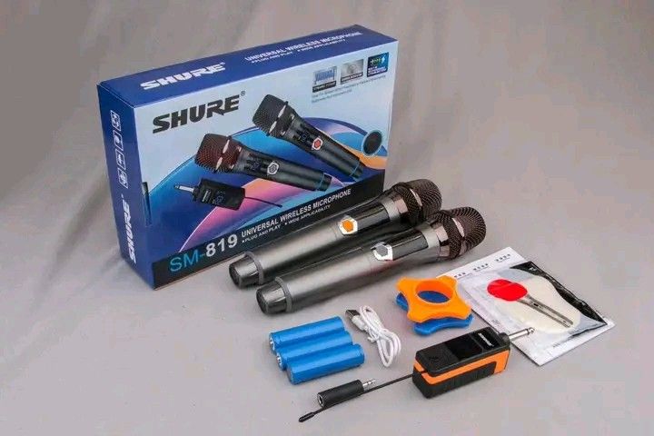 Shure SM-819 Universal Wireless Microphone Dual Set (Category: Microphones) located in Manila. Submitted by iliasjen3082126 (Listing ID 1467902425, Image 2). Description: - Complete Shure SM-819 universal wireless microphone set with dual handheld mics and wireless receiver - Ready for plug-and-play use in karaoke, speeches, and home gatherings - Features clear digital LED display on each microphone body - Includes rechargeable batteries, USB cha