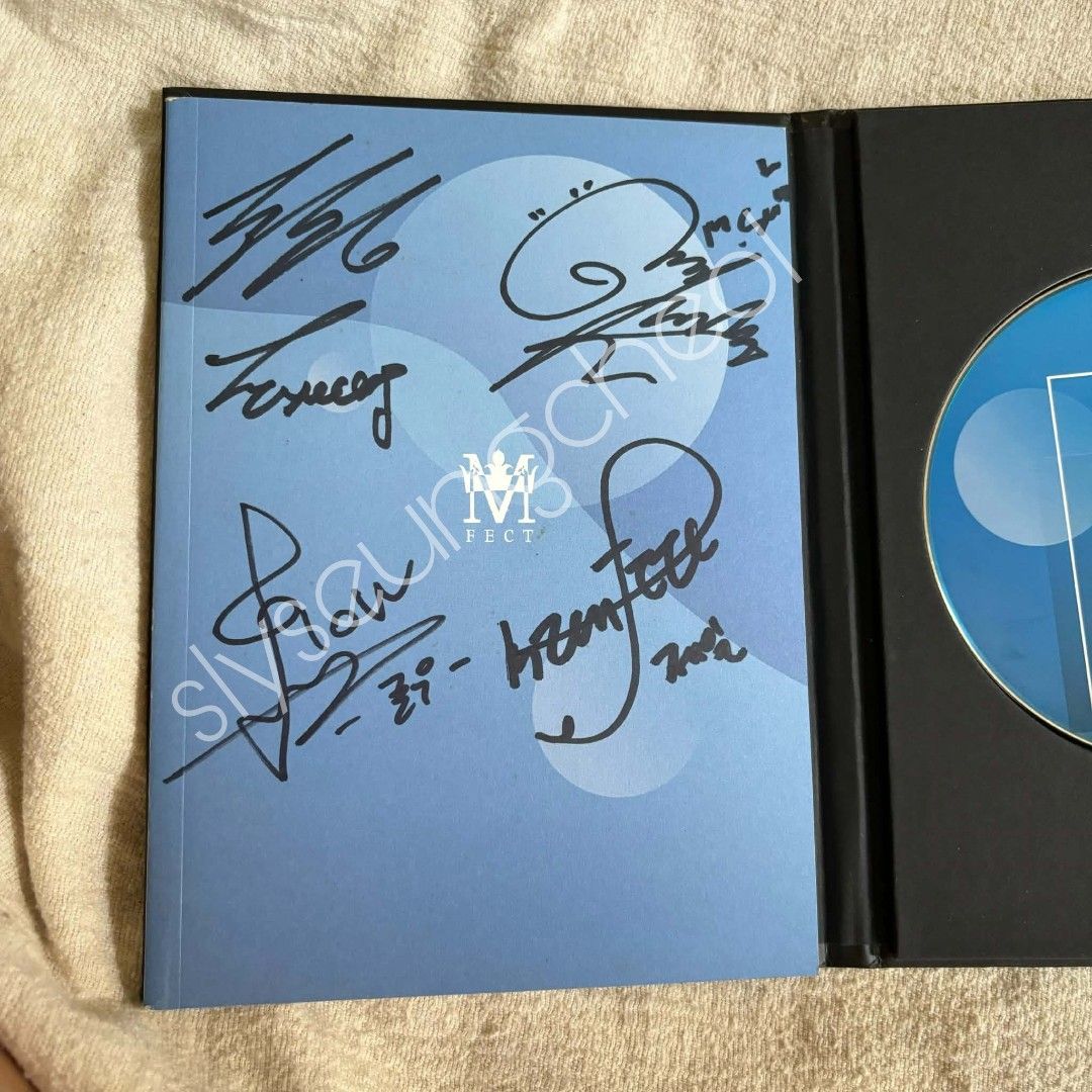 Signed Mfect Designer Album With 9 Photocards pc (Category: K-Wave Merchandise) located in Quezon City. Submitted by usedbynihc (Listing ID 1468029200, Image 2). Description: - Item: Signed Mfect Designer Album - Inclusions: CD, inner sleeve with blue graphics, and complete set of 9 photocards - Special Feature: personally signed by them - Condition: Carefully stored after unboxing, no major flaws - Perfect for: K-pop collectors and fans - Shippi