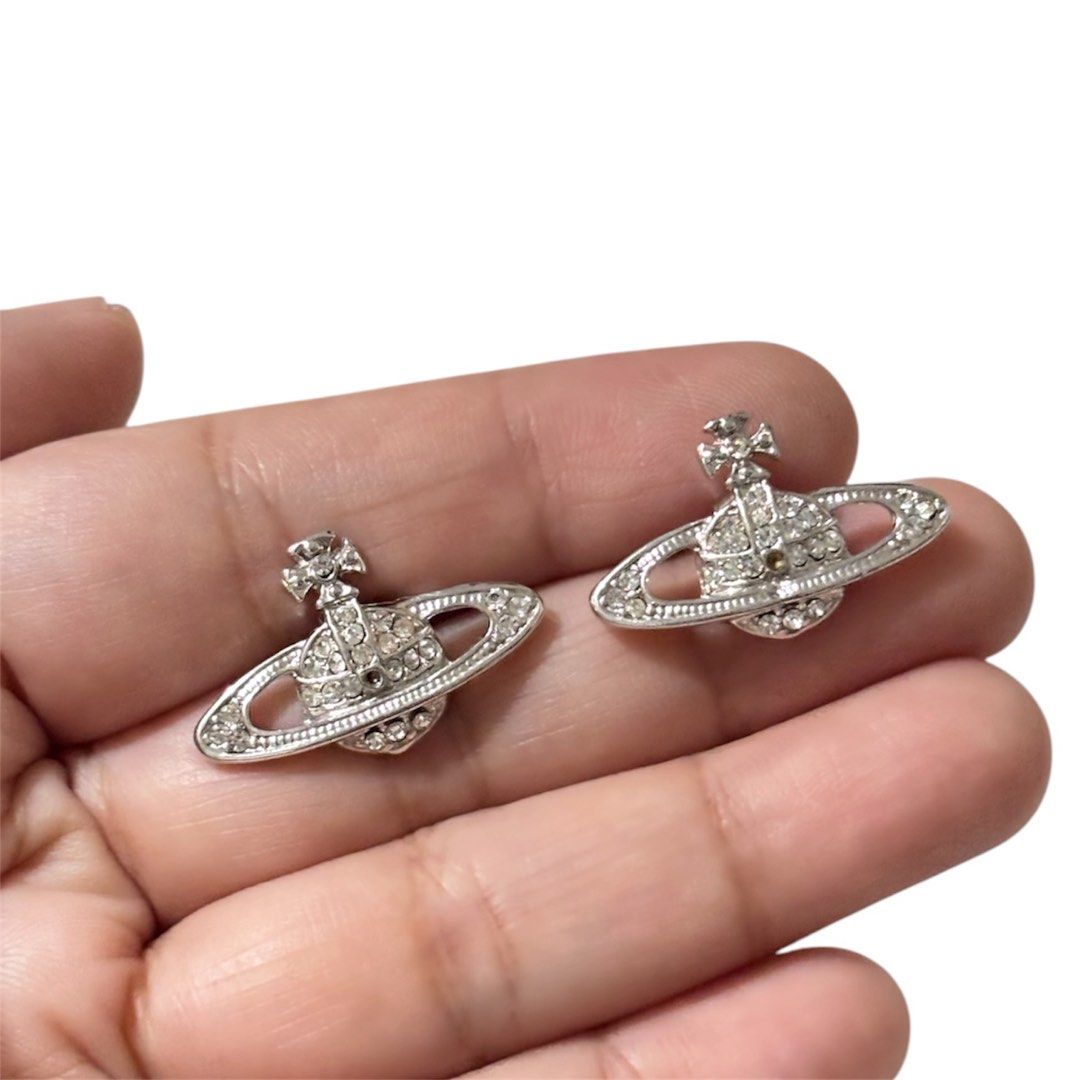 Silver-toned Saturn Earrings (Category: Earrings) located in Paranaque City. Submitted by dalle_closet (Listing ID 1467870700, Image 1). Description: ang nice .
