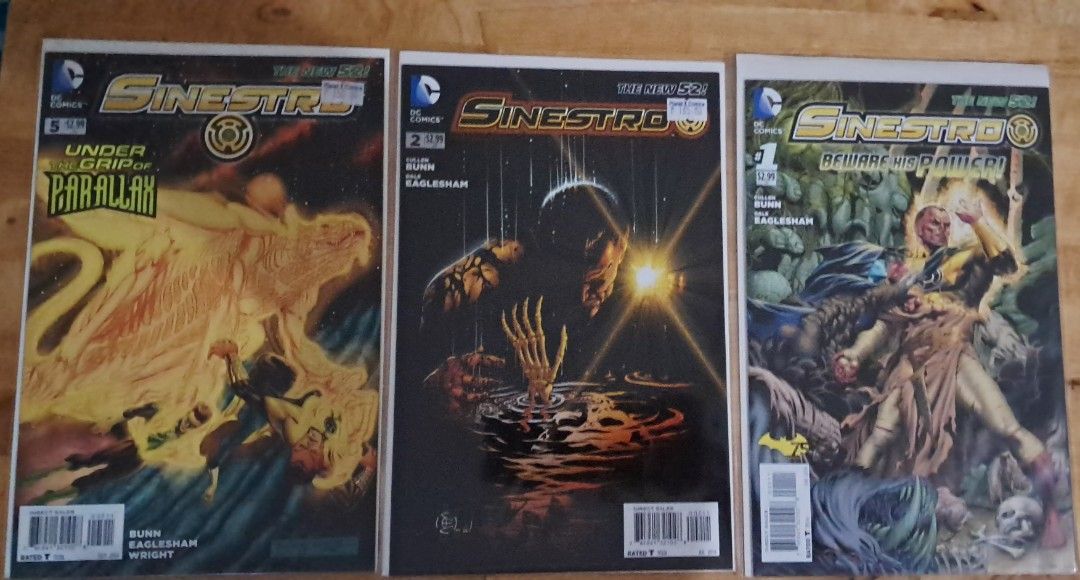 Sinestro The New 52 Comic Books Issues 1, 2, 5 (Category: Comics & Manga) located in Quezon City. Submitted by ernestamaru2 (Listing ID 1467916884, Image 1). Description: - Lot of 3 Sinestro comic books (DC Comics The New 52) - Includes issues: #1, #2, and #5 - Writer: Cullen Bunn - Artist: Dale Eaglesham (Issue #5 also features Wright) - Condition: All bagged and boarded - Note: Original price tags attached on the top right corner of issues #2 a