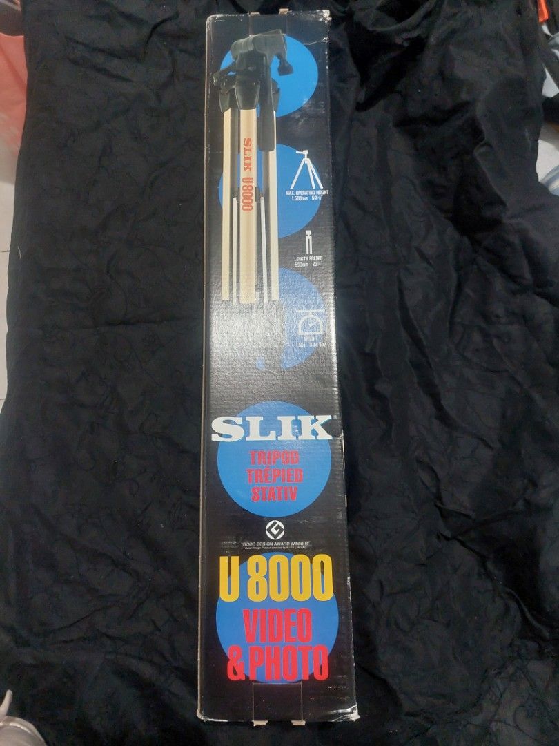 Slik U8000 Video & Photo Tripod (Category: Tripods & Monopods) located in Cainta. Submitted by ceejay.lim (Listing ID 1467876172, Image 1). Description: - Slik U8000 tripod for versatile photo and video shooting - Dual-purpose head for seamless adjustments - Smooth geared center column for precise height control - Quick-release shoe for fast camera mounting - Oversized leg locks for stability and ease of use - Complete with original retail box.