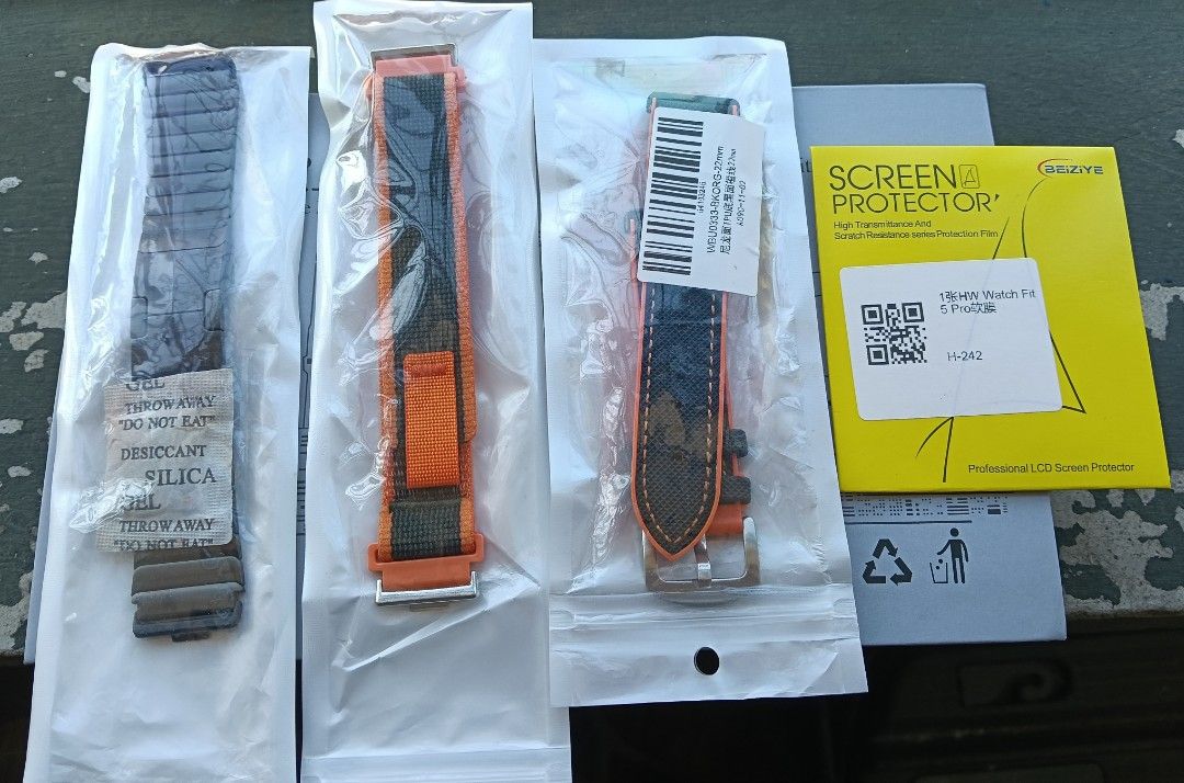 Huawei Fit 5 Pro Smartwatch Straps and Screen Protector (Category: Wearables & Smart Watches) located in Dasmarinas. Submitted by arielvergano (Listing ID 1467914140, Image 2). Description: - HW Watch Fit 5 Pro accessory bundle - Includes 3 stylish replacement straps: Black Magnetic Link, Orange/Grey Nylon Loop, and Black Textured with Orange Stitching - Comes with a Beiziye screen protector - 100% brand new, unopened in original packaging with s