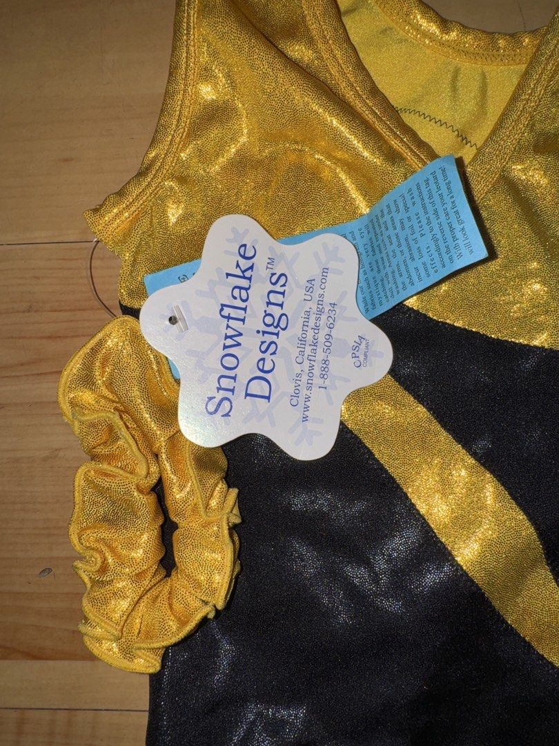 Snowflake Designs Gymnastics Leotard (Category: Activewear) located in Malabon City. Submitted by cheska.p (Listing ID 1467901252, Image 2). Description: - Brand: Snowflake Designs - Size: X-sm - Style: Sleeveless scoop neck - Condition: Brand new with tag - Includes: Matching gold scrunchie .