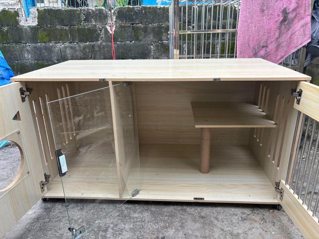 Solid Wood Cat Villa (Category: Shelves, Cabinets & Racks) located in Quezon City. Submitted by carminaaramos (Listing ID 1468049487, Image 2). Description: • Premium light wood finish pet enclosure • With Wheels • Aesthetic and spacious for cats • Doors are intact • No flaws, just very very minimal signs of usage SIZE: 65x120x60cm (Height, Length, Width) RFS: Our nomnom deserves a bigger villa hehe Pick up: Concepcion Uno, Marikina.