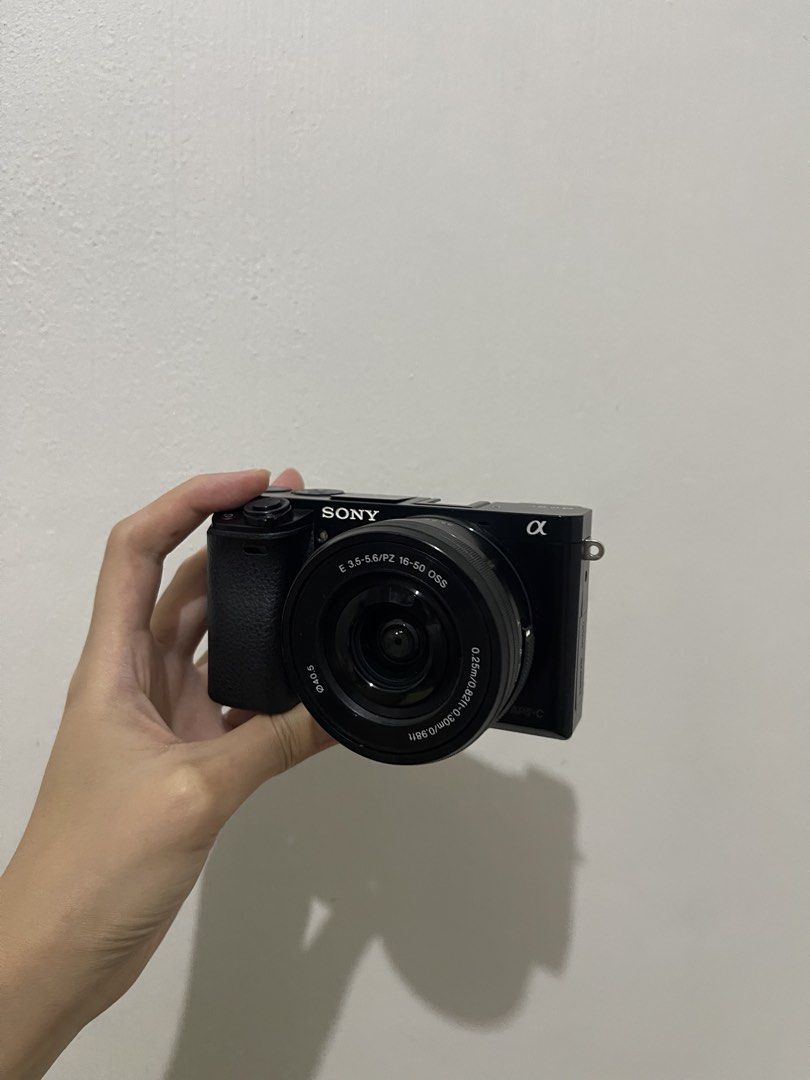 Sony A6000 (Category: Cameras) located in Angeles City. Submitted by ermycloset (Listing ID 1467945554, Image 2). Description: ⋆˚࿔ Sony Alpha 6000 (mirrorless camera) 𝜗𝜚˚⋆ 🏷️ ₱23,999 details: ⤿ 24.3 MP | Kitlens 16-55 mm ⤿ Easy transfer | WiFi Transfer ⤿ Pop up flash | Tilt Screen (45 degrees) ⤿ Viewfinder ⤿ body condition: 10/10 (like new) ⤿ no issue🧸 inclusions: ⤿ original battery, 32 GB SD card, charger, lens cover, and camera bag — angele