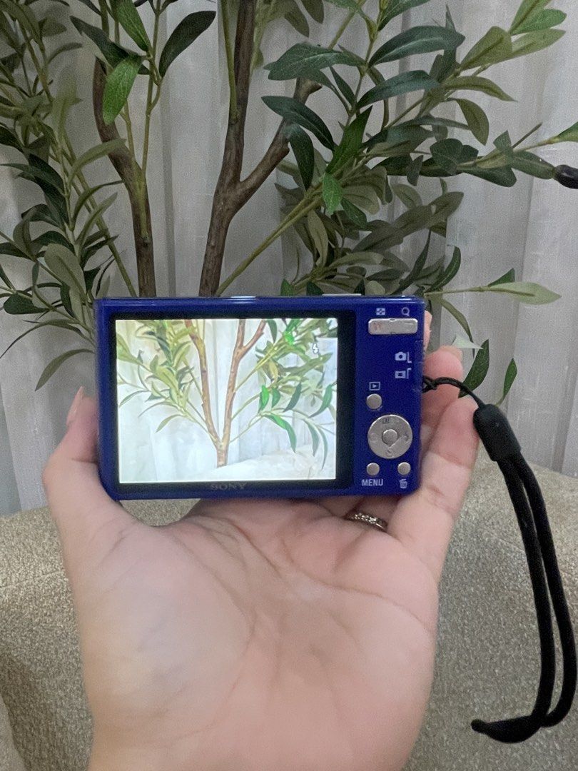 Sony Dsc W330 (Category: Cameras) located in San Antonio. Submitted by katrizaclothing (Listing ID 1468058655, Image 2). Description: - Model: Sony Cyber-shot Digital Camera - Color: Striking Blue - Resolution: 14.1 Megapixels with Carl Zeiss lens - Condition: Powers on and displays clearly on rear LCD screen - Included: Wrist strap attached - Features: Pocket-sized and ultra-portable - Ideal for: Everyday snapshots and aesthetic retro photos.
