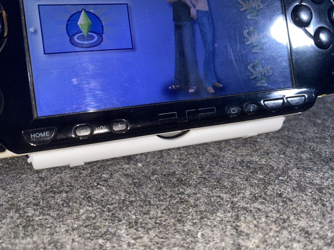 Sony PSP 2004 Slim (V2) (Category: PlayStation) located in Paranaque City. Submitted by cheska.zaldivar (Listing ID 1467913559, Image 2). Description: 🎮 Selling my pre-loved Sony PSP 2004 Slim (V2). Details: • Model: Sony PSP 2004 Slim • Jailbroken / modded • 8GB memory card included • Filled with games and ready to play! 🎮 Condition: ✅ Playable and ready for gaming ✅ Loaded with games ⚠️ LCD MARK: Has a slight mark on the LCD that is only visi