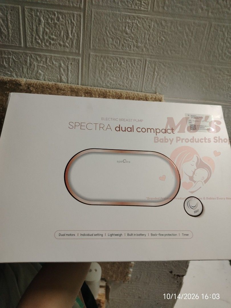 Spectra Dual Compact Electric Breast Pump (Category: Breastfeeding & Bottle Feeding) located in Pulilan. Submitted by mjbabyproductsshop (Listing ID 1467912202, Image 1). Description: - Authentic Spectra dual compact electric breast pump (White & Rose Gold) - Includes main pump body, rechargeable battery charger, component box, and bottles with nipples - Dual independent motors with customizable settings for each side - Built-in back-flow protect