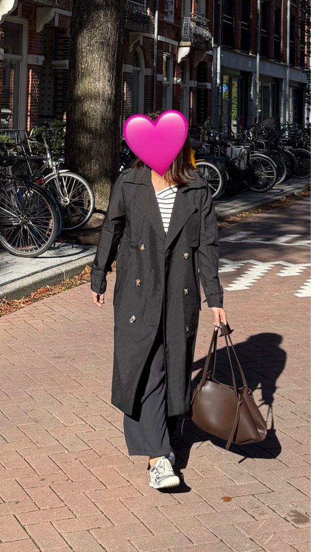 Spring/Autumn Black Double-Breasted Trench Coat (Category: Coats, Jackets and Outerwear) located in Makati City. Submitted by angel.ad (Listing ID 1467895416, Image 2). Description: - Black with dark buttons, double breasted, with belt - Fabric has weight to it, kept me comfortable at 12-15degC - ideal for spring/autumn - Used once only. Super fresh pa!! -Size M, Im usually Size S but I sized up for longer length and oversize fit.