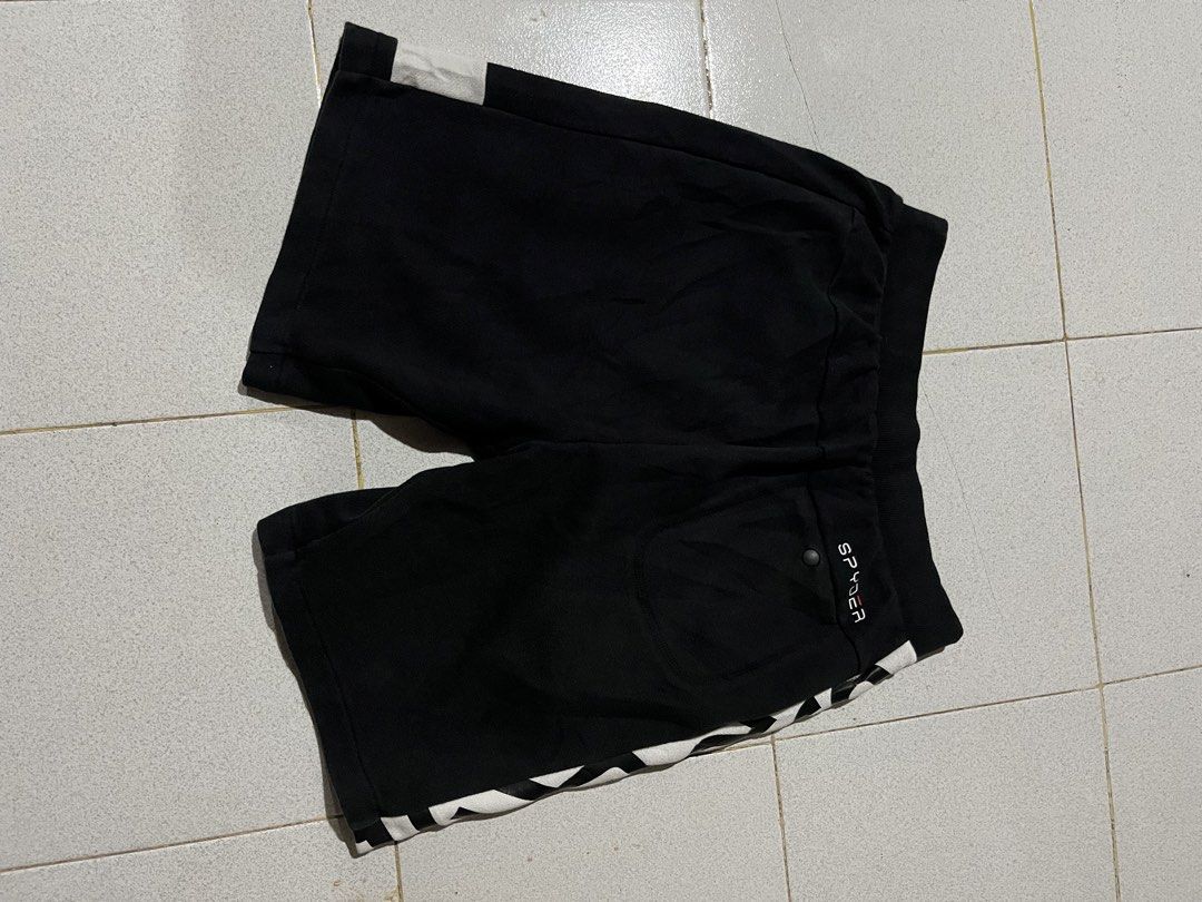 Spyder Black and White Athletic Shorts (Category: Shorts) located in Manila. Submitted by matik6 (Listing ID 1468020173, Image 2). Description: Spyder athletic shorts in black with white and black graphic print panels. Elastic waistband with ribbed texture. Small spider logo on the front lower leg and brand lettering on the back pocket. Soft cotton fabric, great for workouts or casual wear..