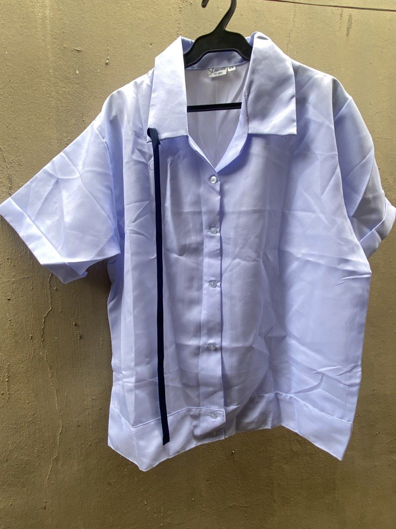 St Marks by Gina white uniform blouse size 4X (Category: Blouses) located in Muntinlupa City. Submitted by 4eva3volve (Listing ID 1467947729, Image 1). Description: - Brand: St Marks by Gina - Size: 4X - Color: White - Style: Short sleeve, collared neckline, front button closure - Special Detail: Built-in dark ribbon accent down the front (can be removed) - Condition: Clean fabric with tag attached at inner collar, ready to wears - Ideal For: Sch