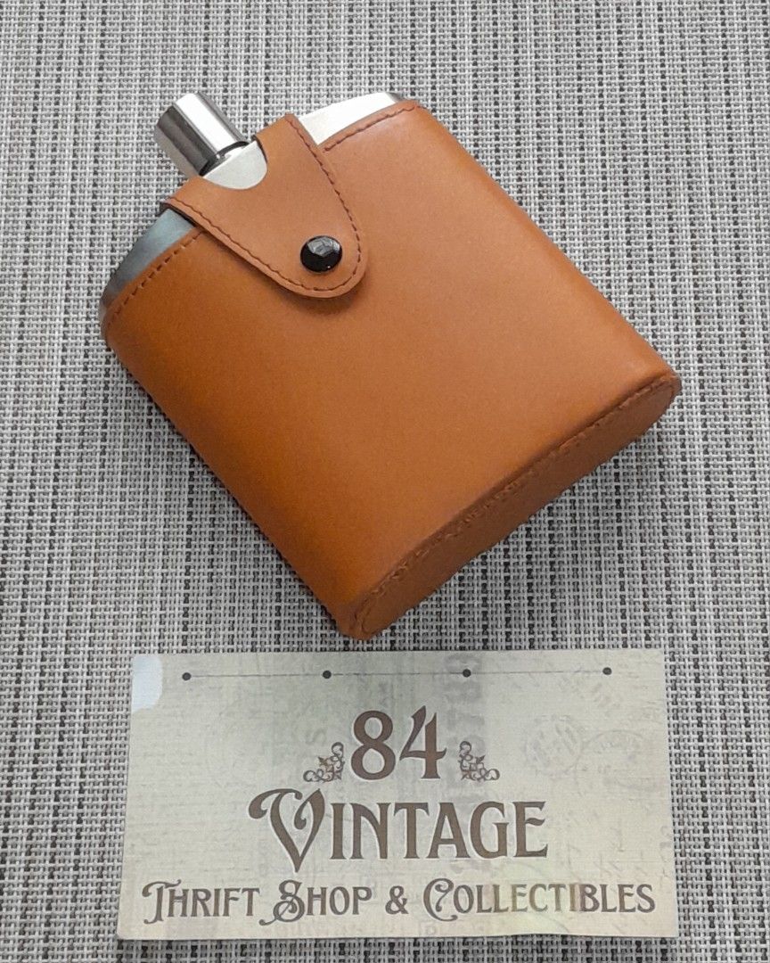 Stainless Steel Flask (Category: Vintage Collectibles) located in Las Pinas. Submitted by 84vintage (Listing ID 1467897021, Image 1). Description: Another Excellent gift idea for the Connoisseur. An elegant flask with Leather case. Actual photos posted. Please examine them carefully as they are part of the description. --📌 MUST READ Before Dealing with us 📌-- ⚠️Price is posted. No lowballs please. ⚠️Vintage items are only sold As Is Where Is. I